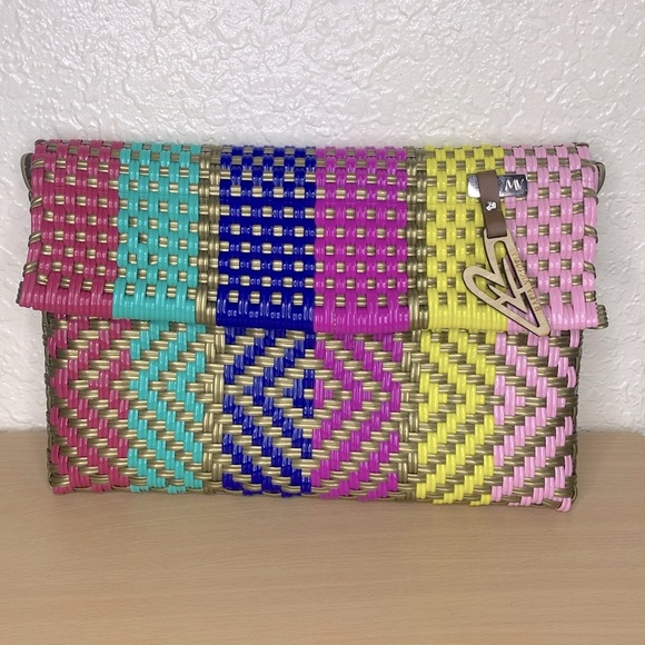 maria victora Handbags - Maria Victoria plastic strew clutch